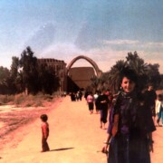 BNAziz at the great archway of Ctesiphon, (height 121 ft), along with Iraqi weekend visitors, Iraq, 1989.