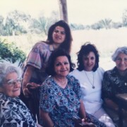 Nazira (l) and her sister Suad (r) flank fellow Al-Radi family members and the author at their farm outside of Baghdad, 1995. It would never again be the carefree retreat they had enjoyed before 1990
