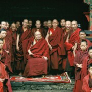 Formal portrait of Thupten Choeling Abbot Trulshik Rinpoche (1923-2011) with senior monks along with young initiates.